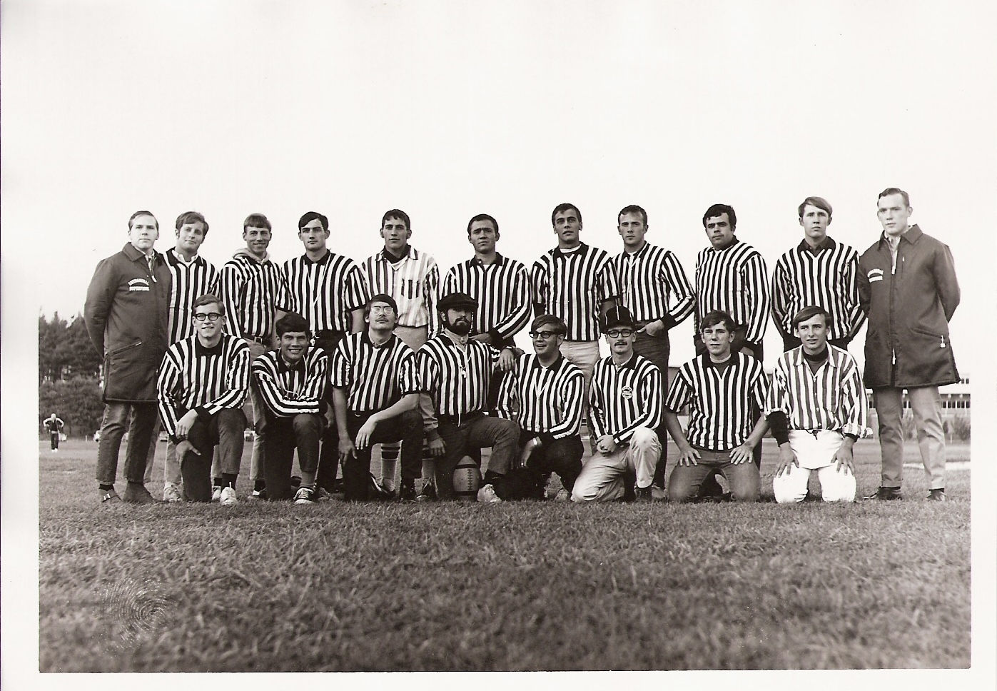 group of referees in striped uniform circa 1966-68