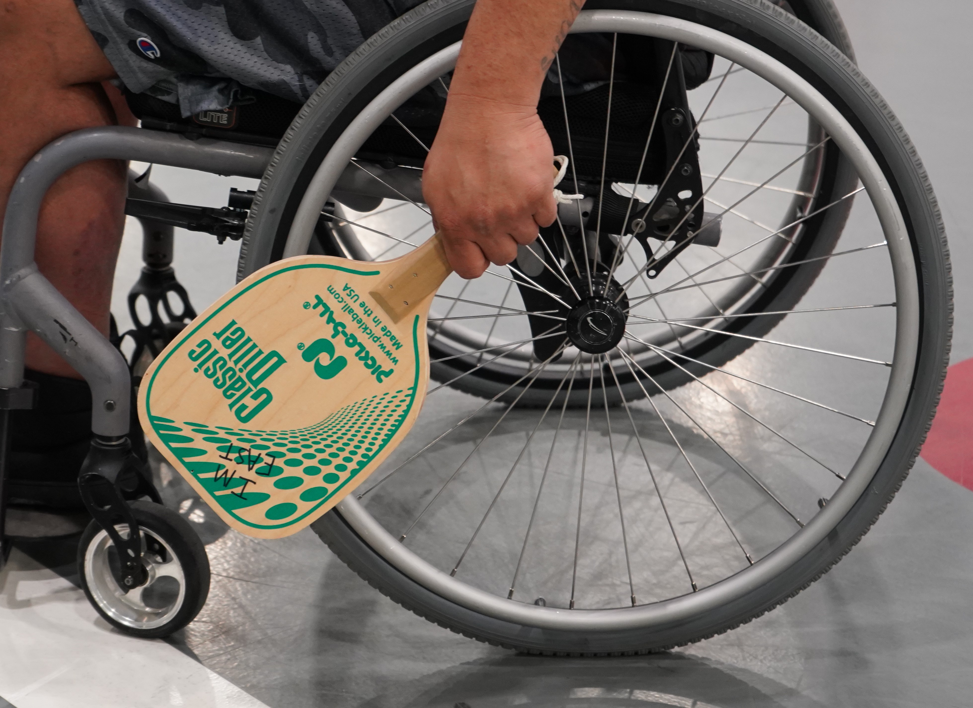 Closeup of adaptive pickleball played in a wheelchair